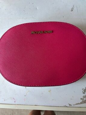Michael Kors Fuchsia Oval Crossbody with Gold Logo